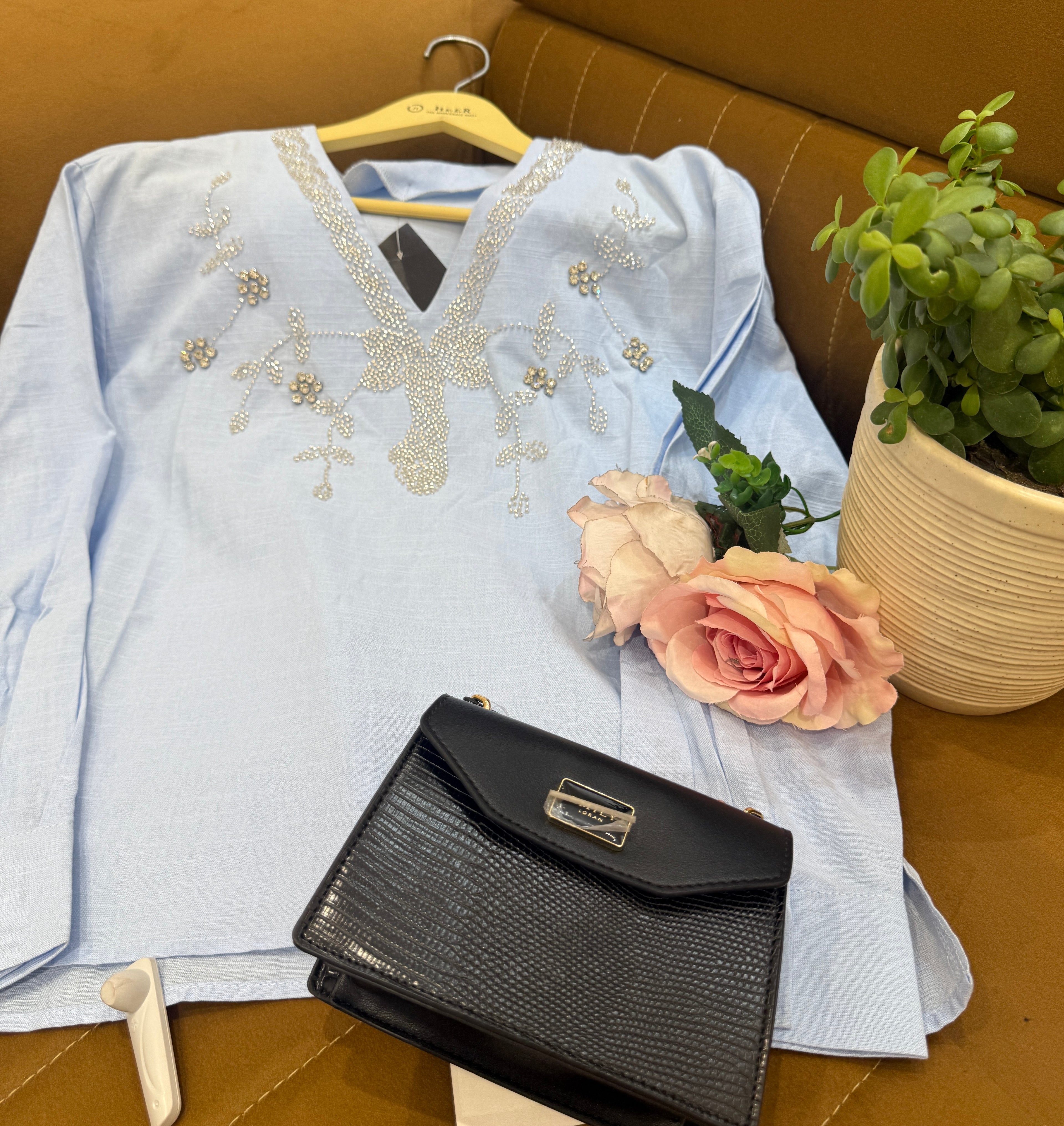 Q562587 Sky Blue Pearl Embellished top