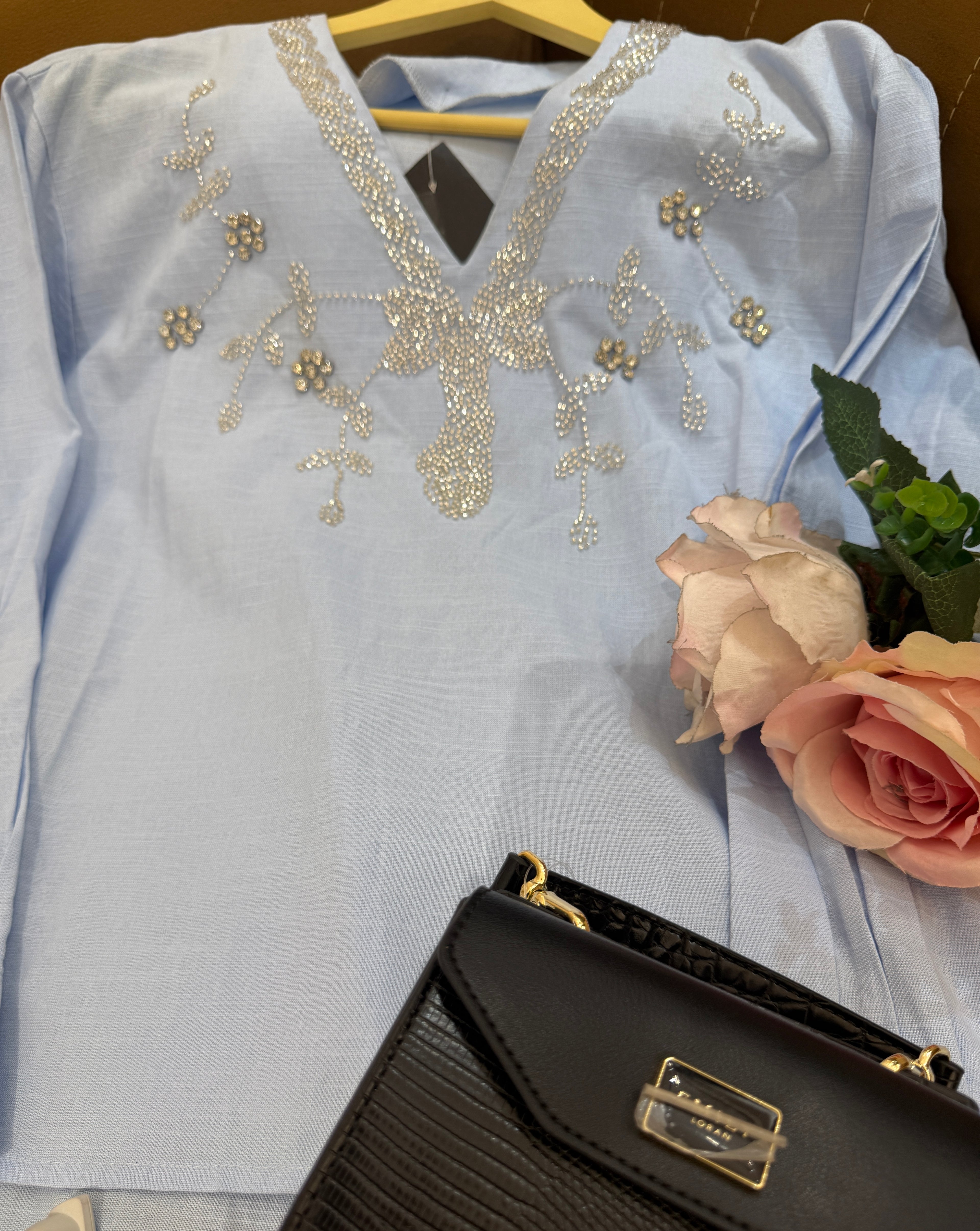Q562587 Sky Blue Pearl Embellished top