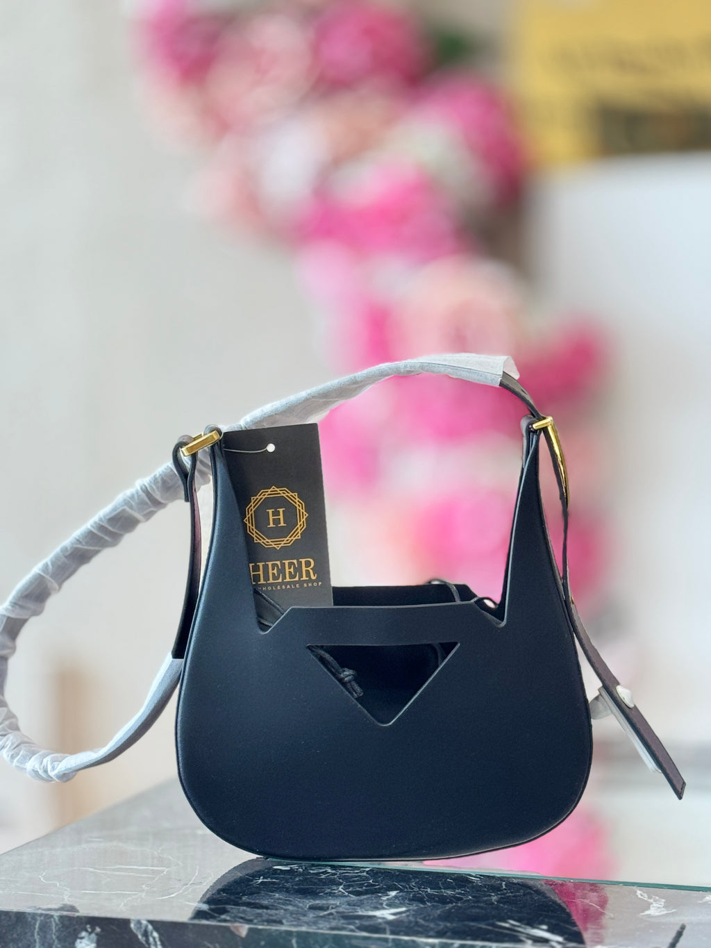 Q562711 Architectural Cut-Out Bucket Handbag