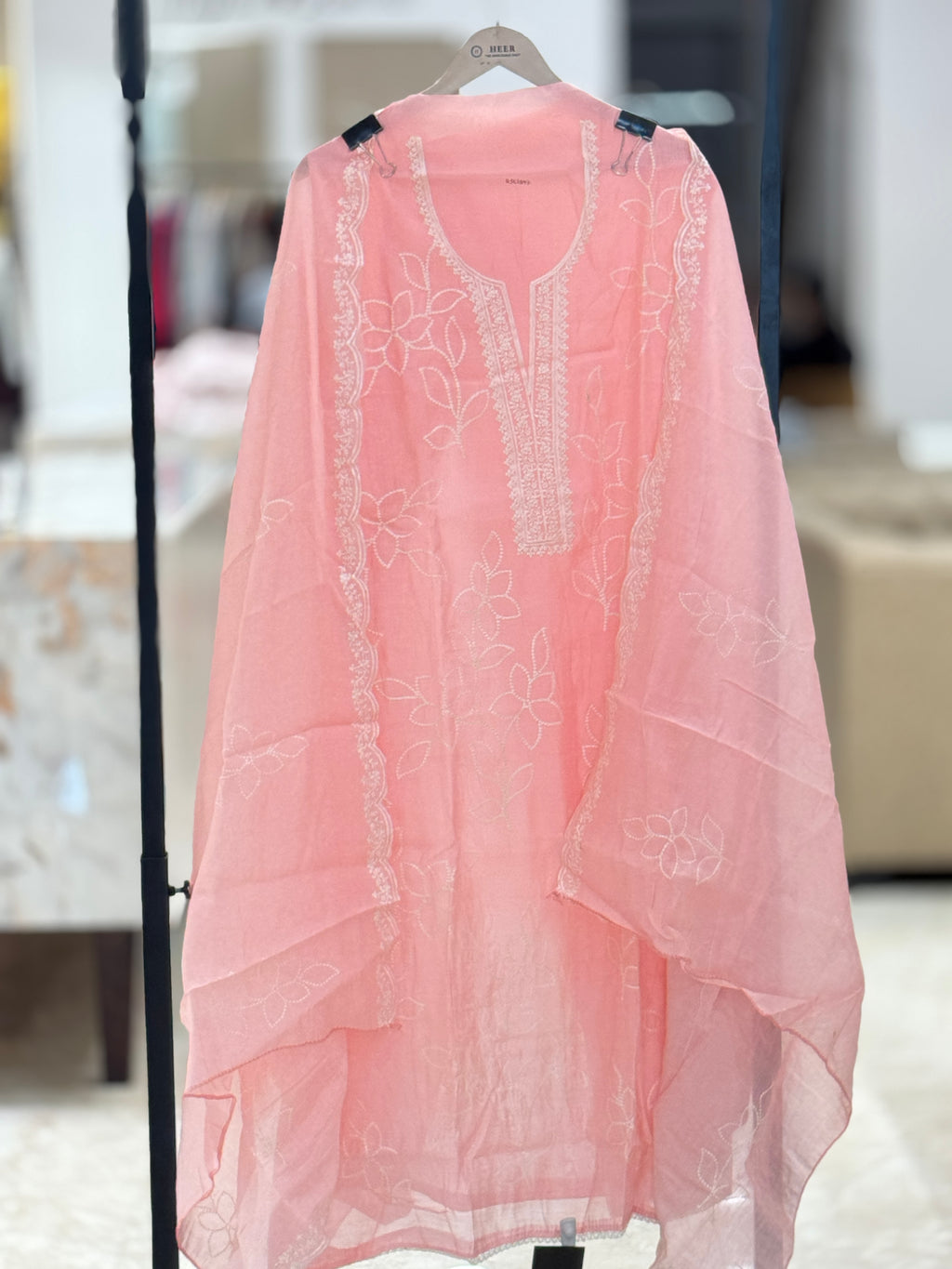 Q562897 Elegant Peach-Pink Unstitched muslin Suit with Minimalist White Floral Embroidery