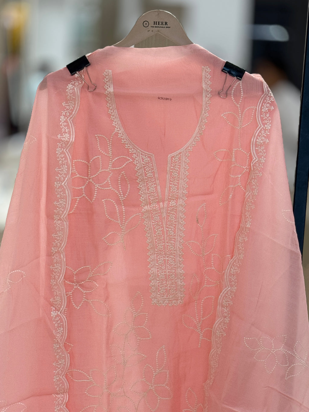 Q562897 Elegant Peach-Pink Unstitched muslin Suit with Minimalist White Floral Embroidery