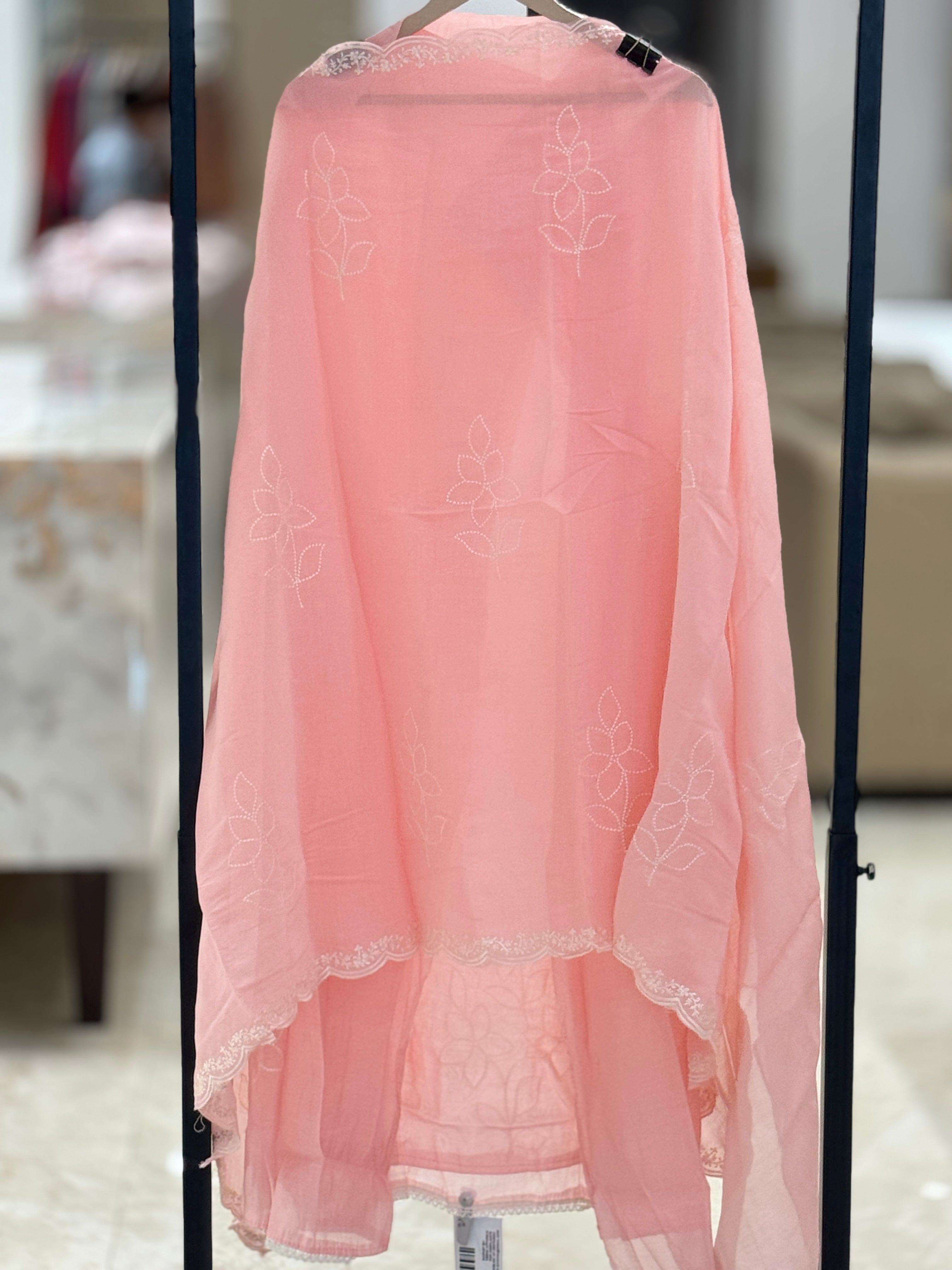Q562897 Elegant Peach-Pink Unstitched muslin Suit with Minimalist White Floral Embroidery