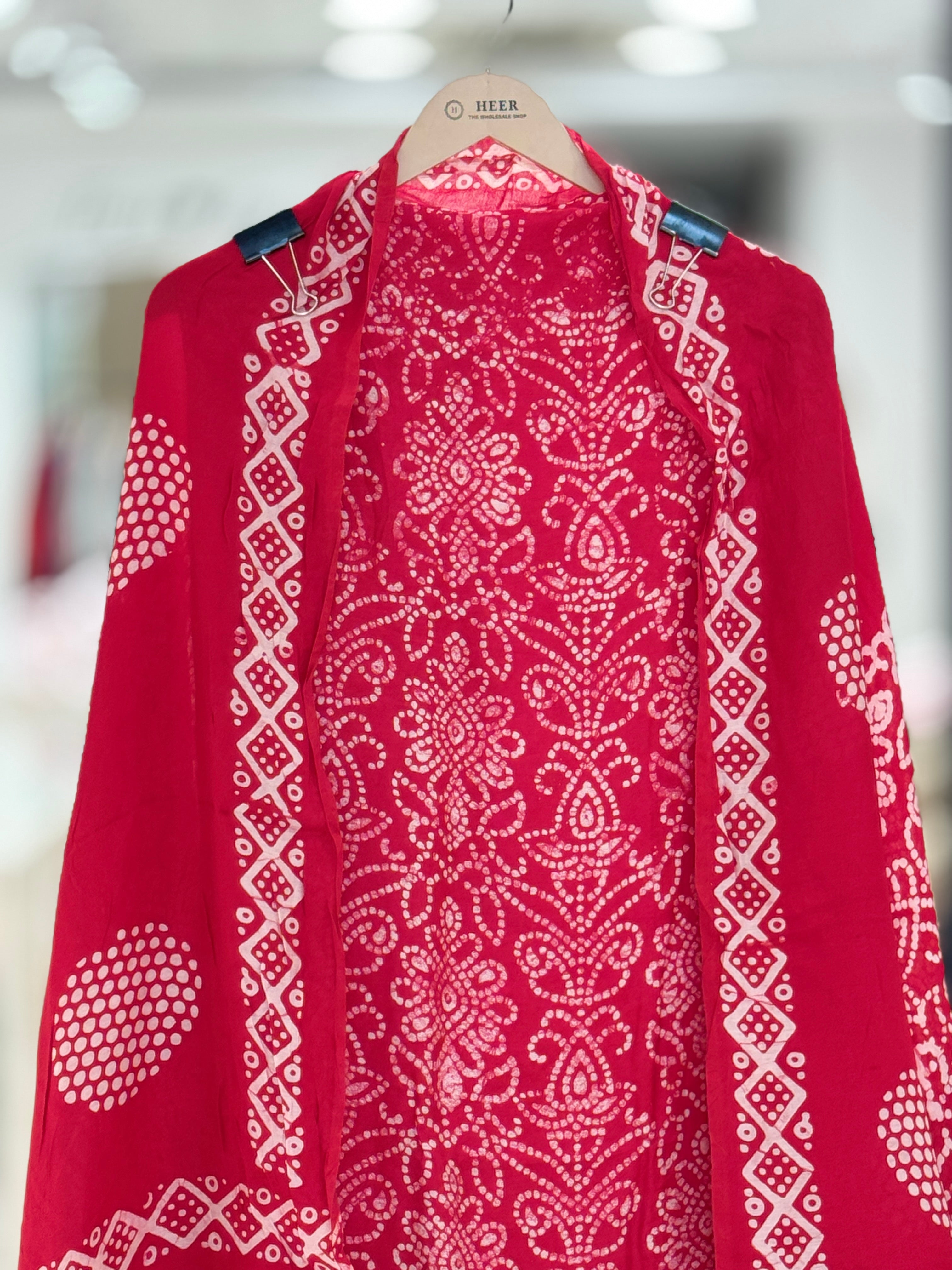 Q562896 Red Unstitched Bandhani Print cotton Suit with Rich Gold Zari Borders