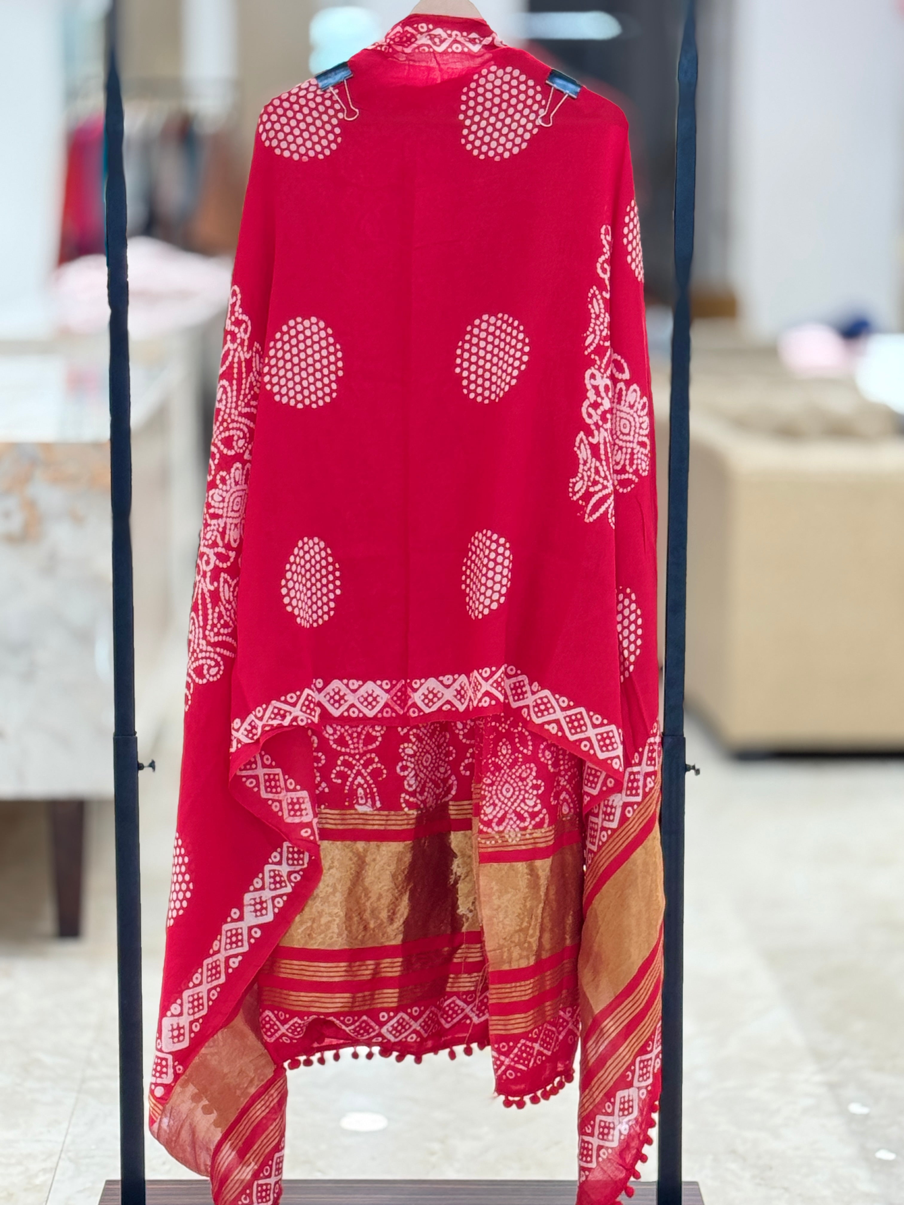 Q562896 Red Unstitched Bandhani Print cotton Suit with Rich Gold Zari Borders