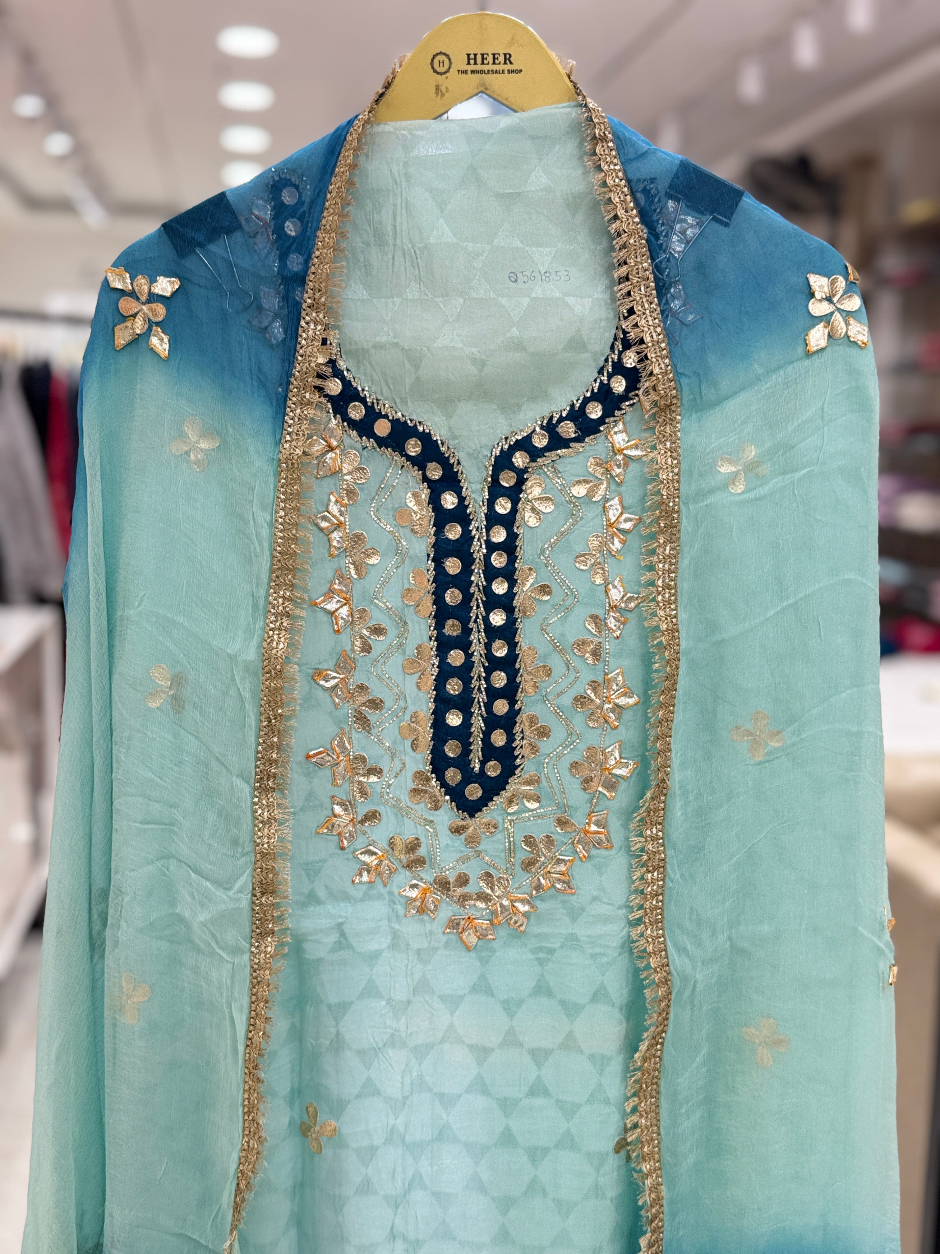Q561853 Hand-crafted Gota Patti work on the neckline and borders