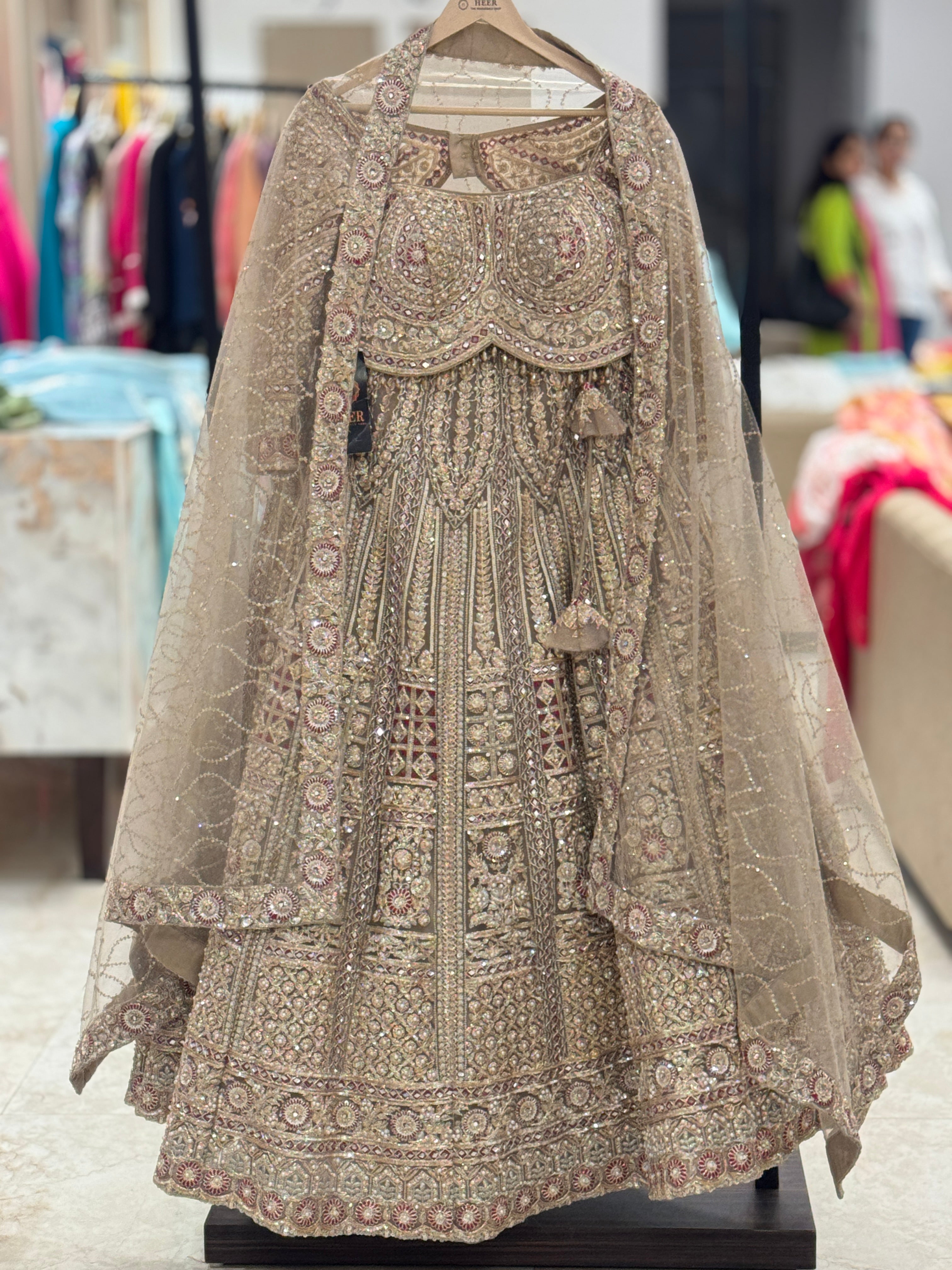 Q562266 beige designer lehenga and readymade blouse set featuring heavy hand-work
