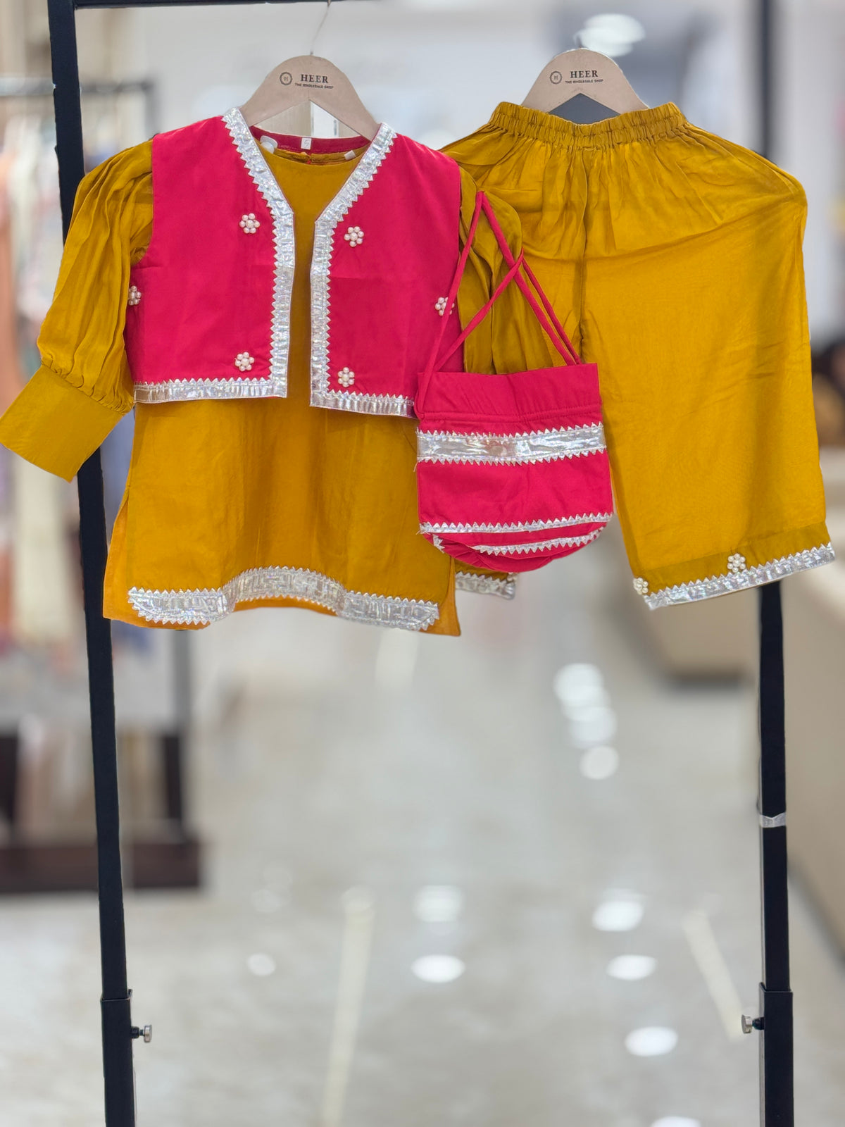 Radiant Mustard & Hot Pink Peplum Kurta with Sharara and Potli Bag Set q562958