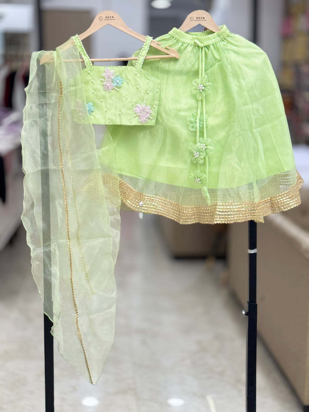 Exquisite Pistachio-Green Tulle Lehenga Choli with Hand-Embellished Floral Detail q562955