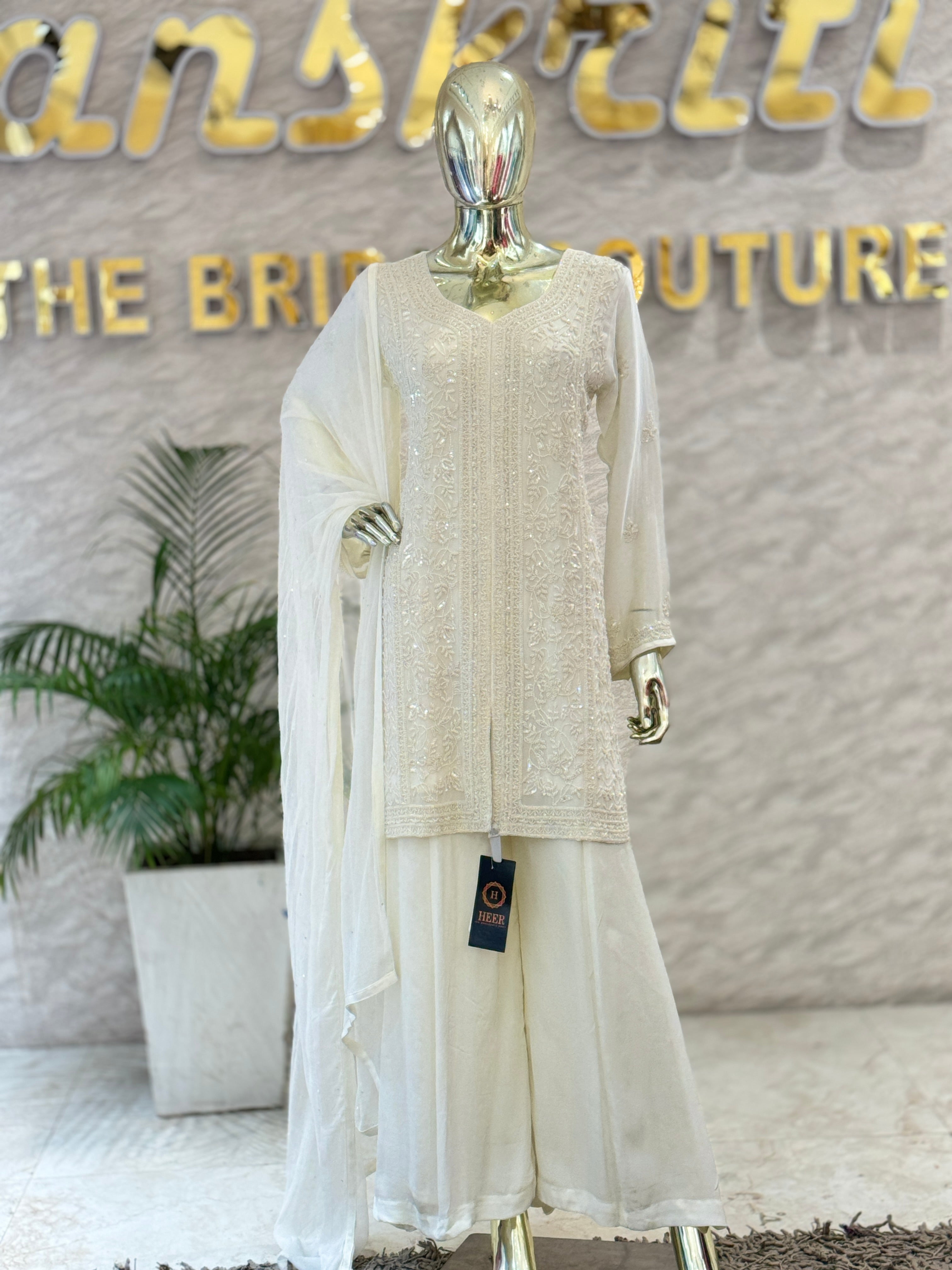 Q562440 Elegant White Heavy Embroidered Kurta Sharara Set with Dupatta