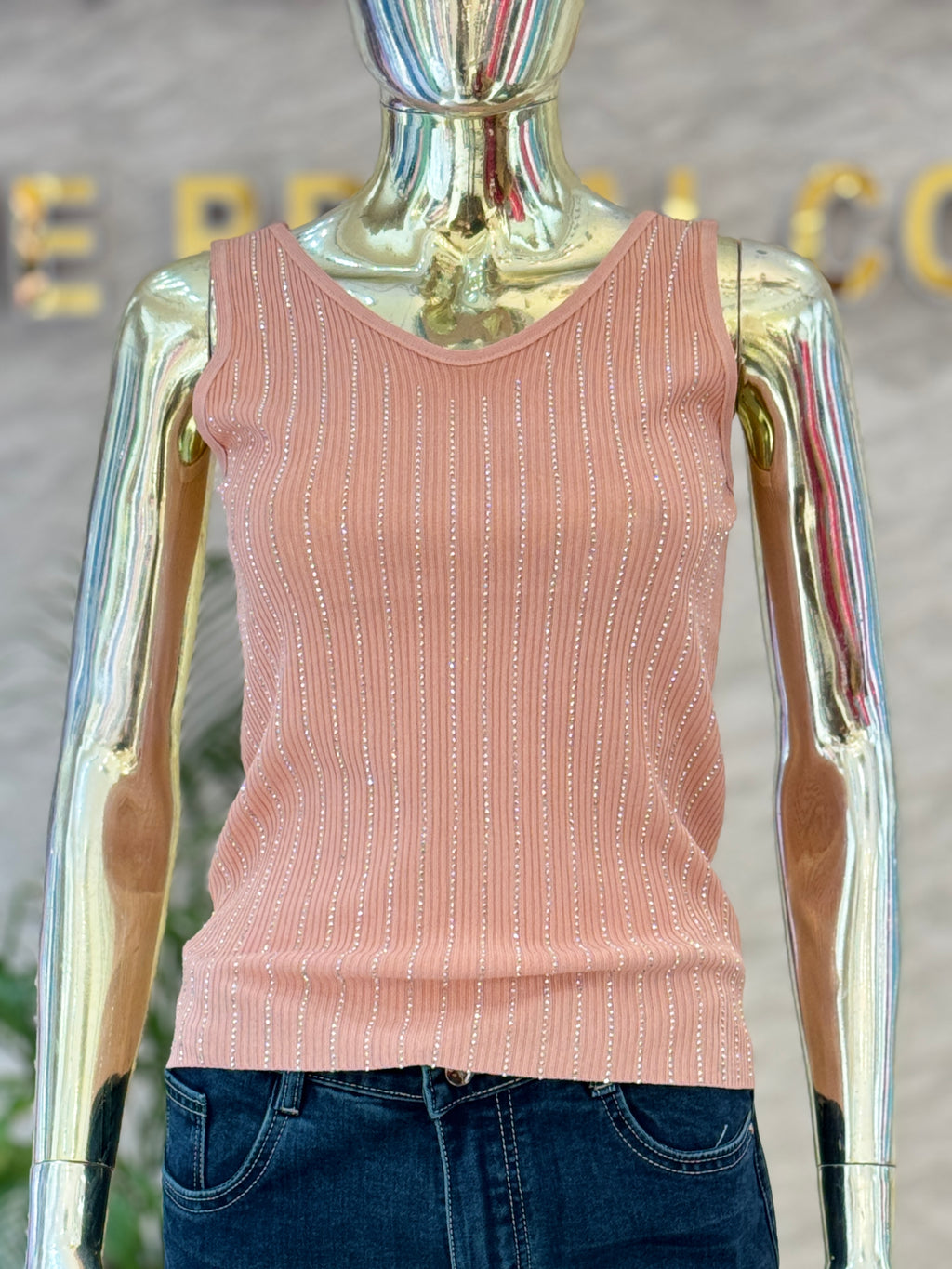Q562603 Chic blush pink ribbed tank top with a stylish crisscross back design