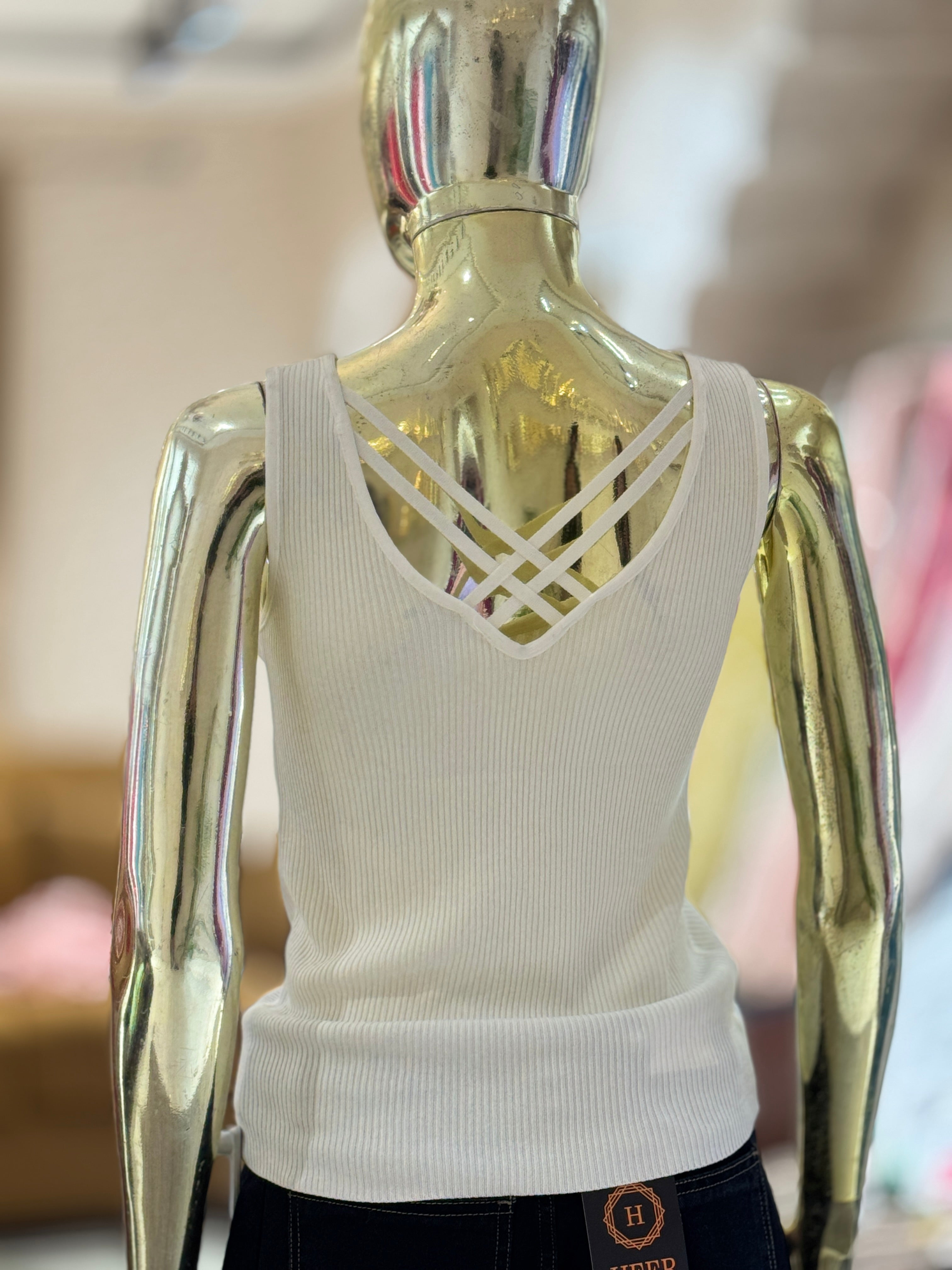Q562325 Elegant white sleeveless knit top with pearl neckline and stylish crisscross back design