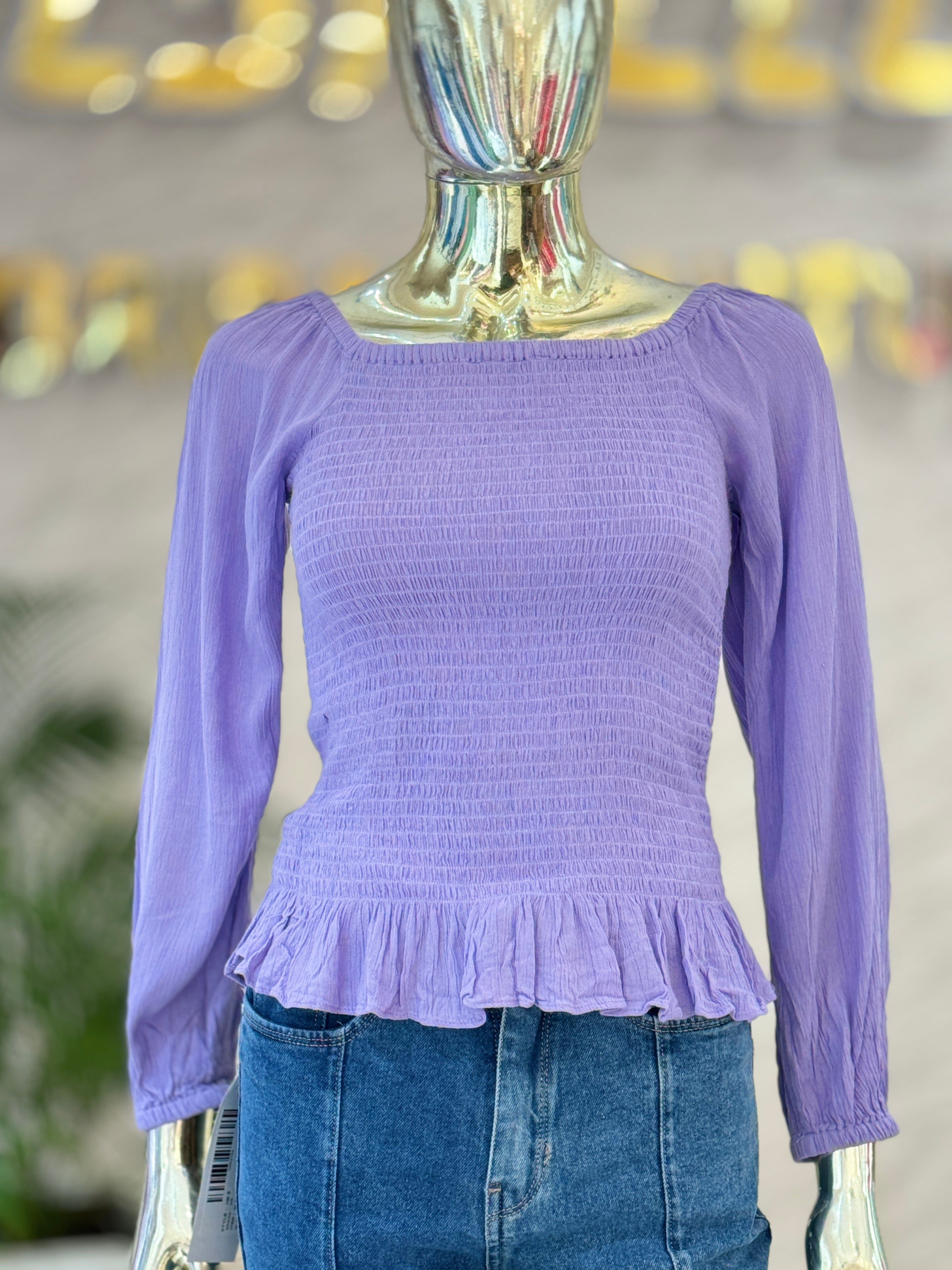 Q562754 Elegant lavender smocked peplum top with full sleeves and a flattering square neckline.