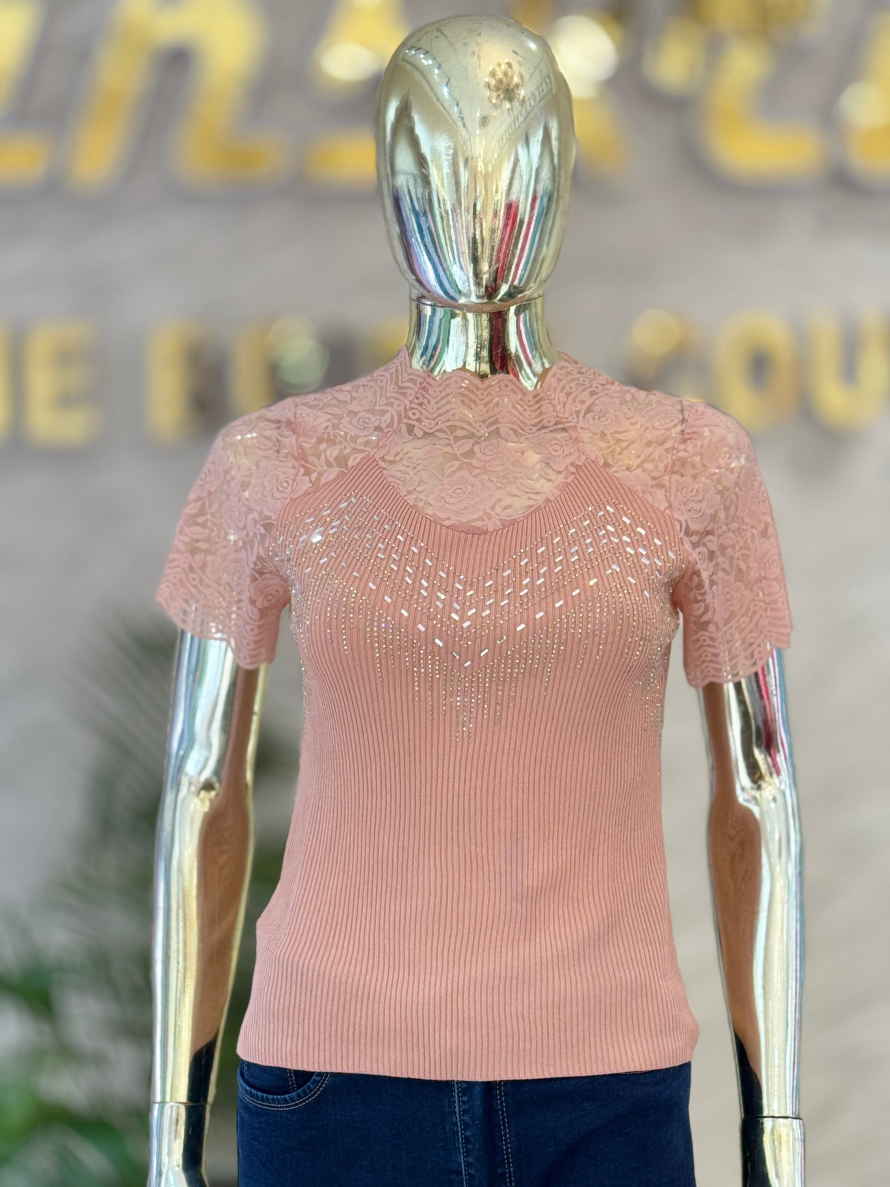 Q562318 Elegant blush pink lace top with delicate shimmer detailing and a chic fitted silhouette