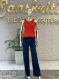Q562325 Trendy dark orange sleeveless top with pearl neckline and stylish crisscross back design.