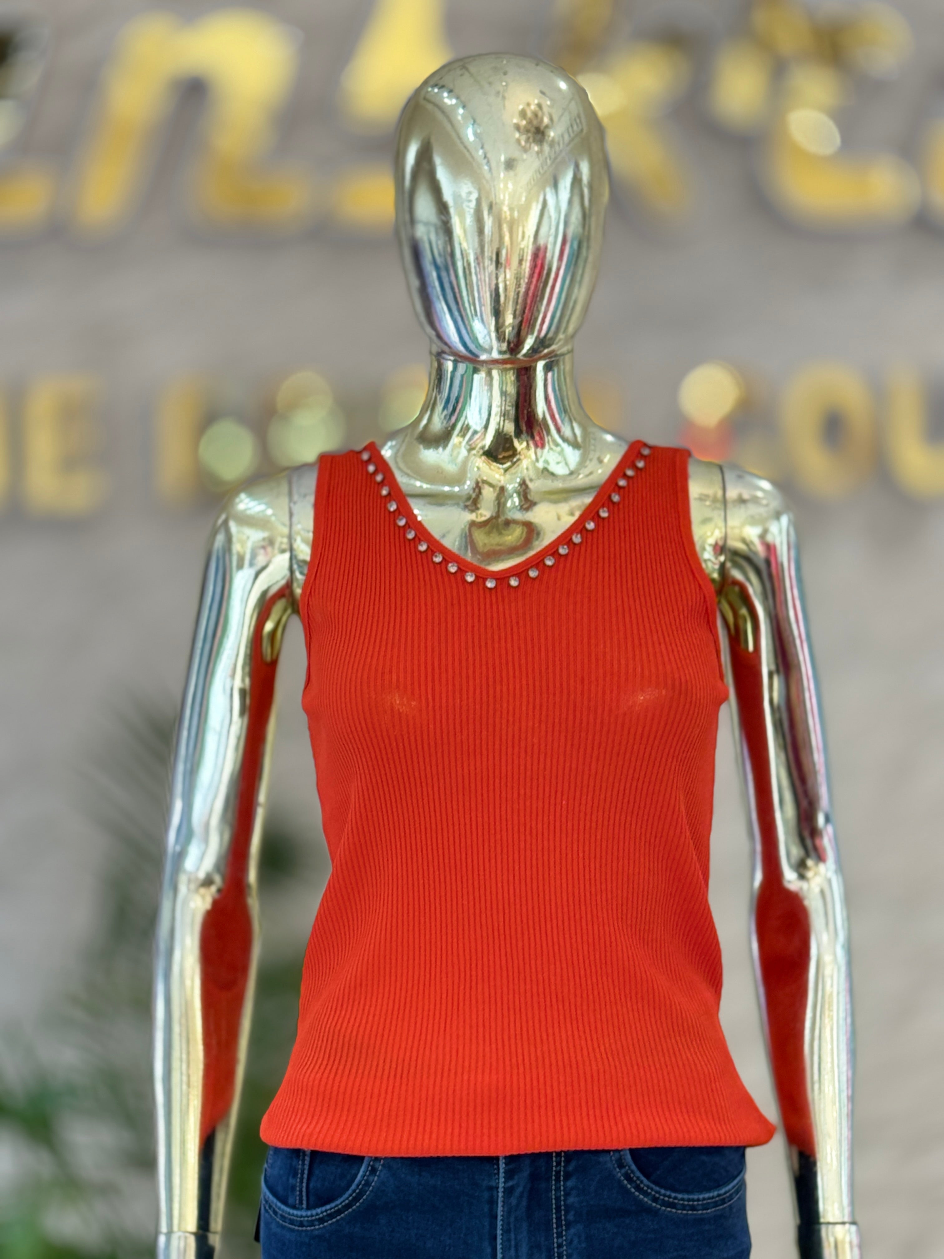 Q562325 Trendy dark orange sleeveless top with pearl neckline and stylish crisscross back design.