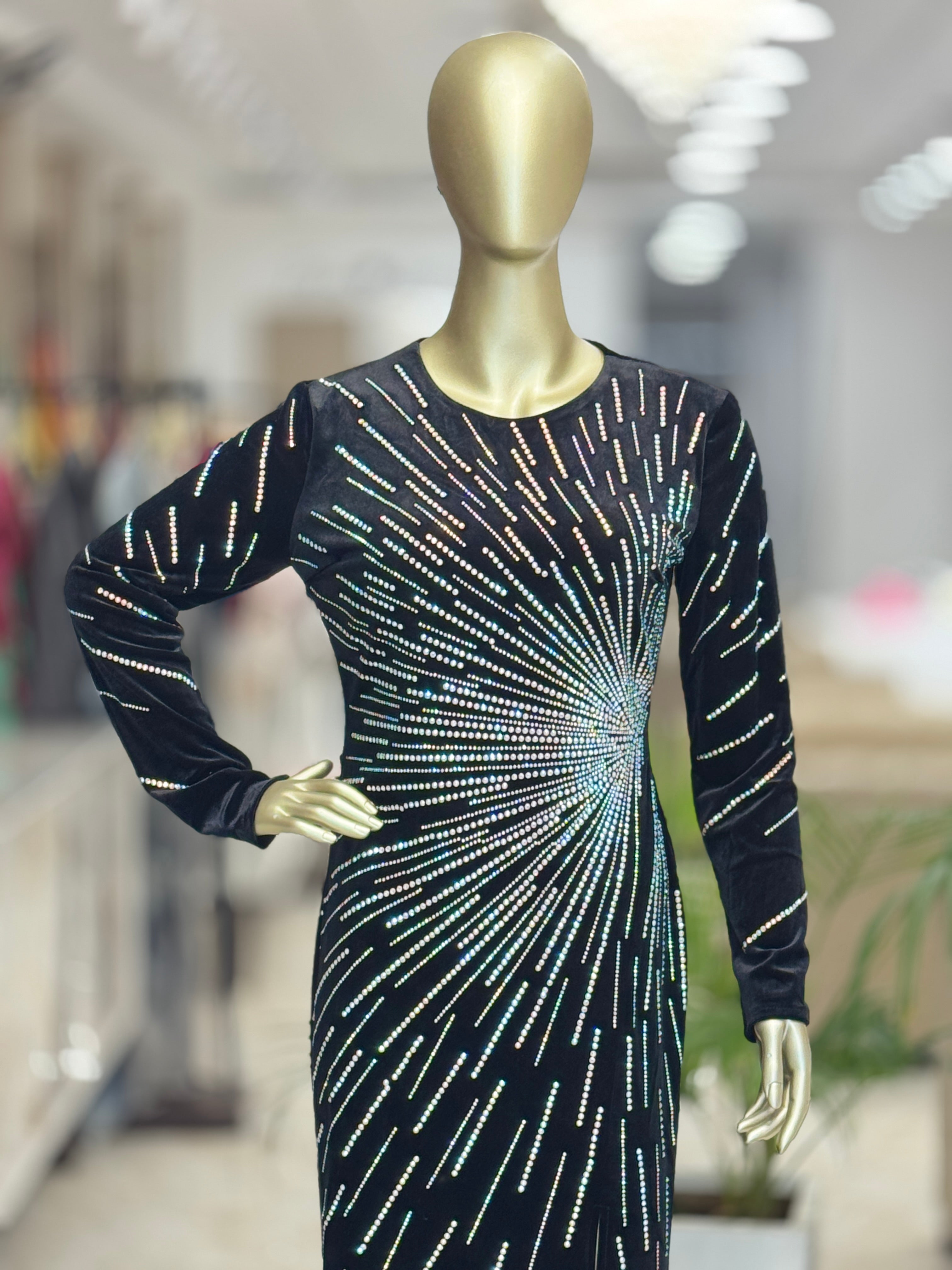 Q562152 Elegant black sequin gown with dazzling starburst detailing and a sleek front slit