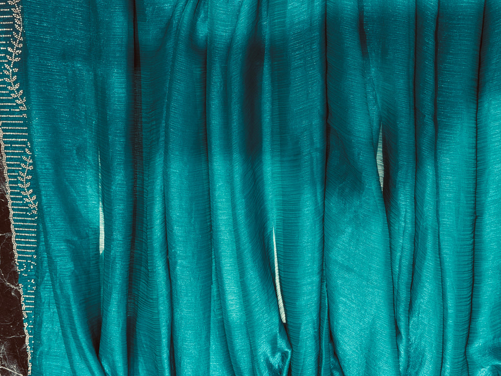 Majestic Peacock Teal Crinkle Silk Saree with Hand-Studded Border q562437