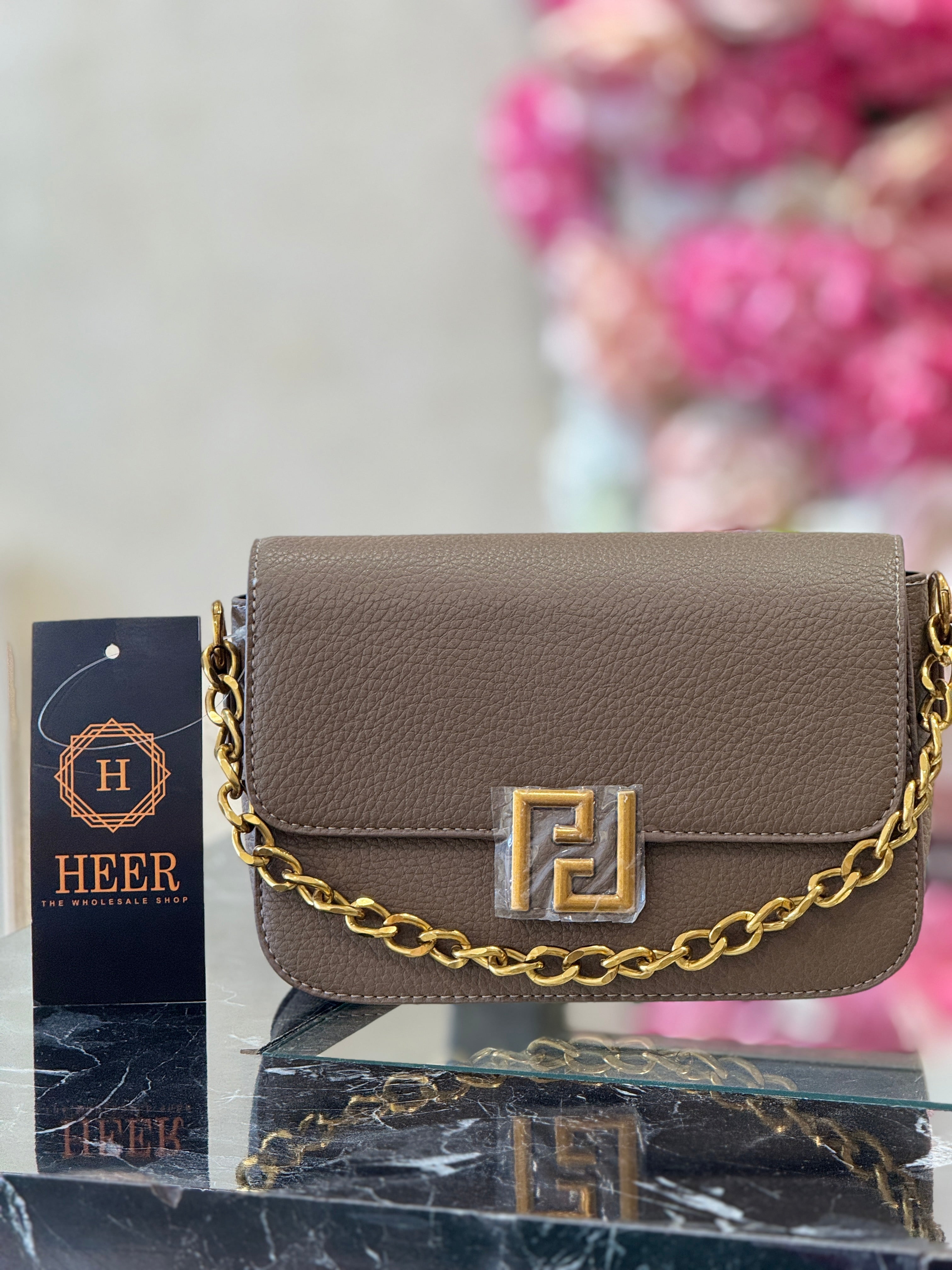 Q562475 Elegant Brown Textured Sling Bag with Gold Chain Strap
